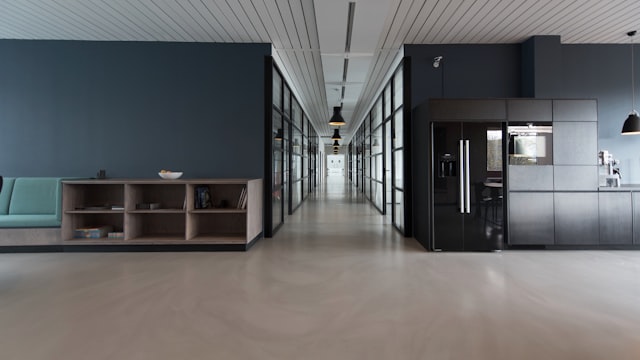 Suspended modular acoustic ceiling grid with mineral fiber sound absorption tiles