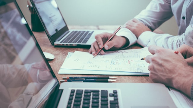 Reviewing and signing real estate settlement closing cost documentation